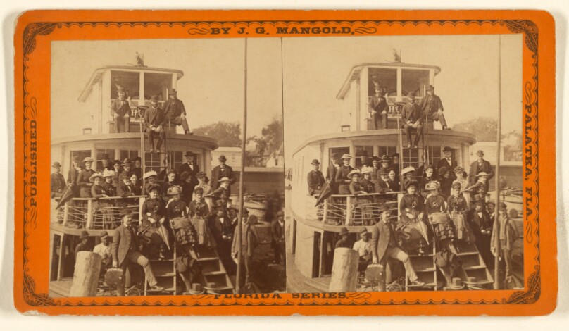 [Group of people on a ferry boat]