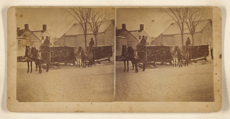 [Two men, each on a horse-drawn wagon filled with logs, possibly at Lincoln, Maine]