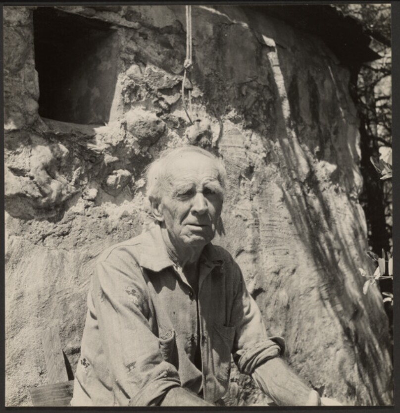 Bill Adams in Dutch Flat [half figure view, seated, chair visible]