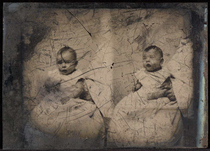 [Double portrait of a baby]