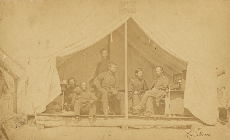 [Soldiers at ease]