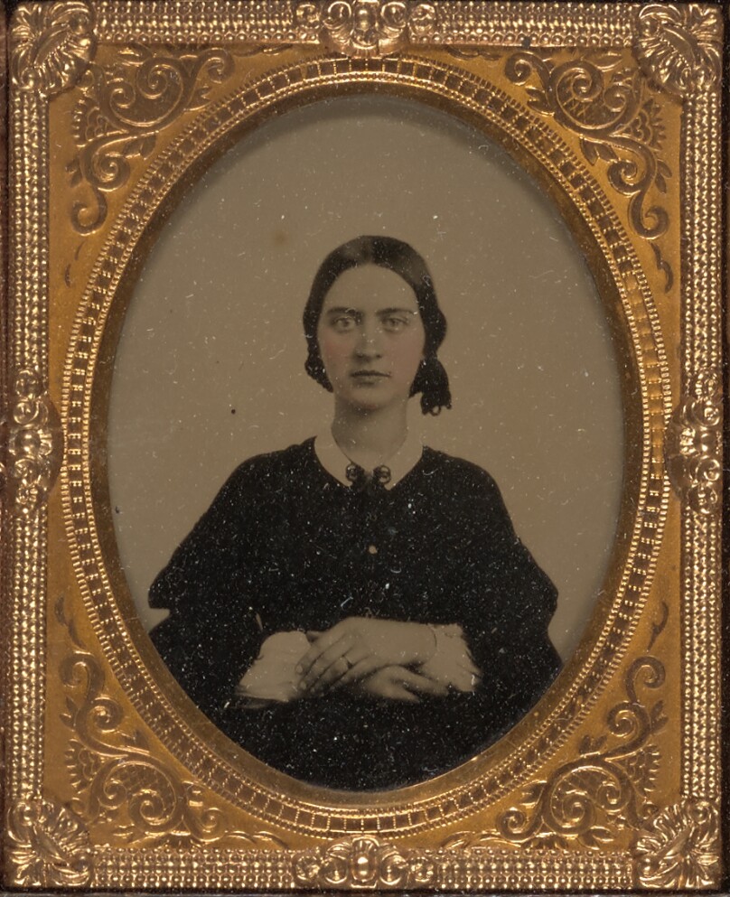 [Woman seated]