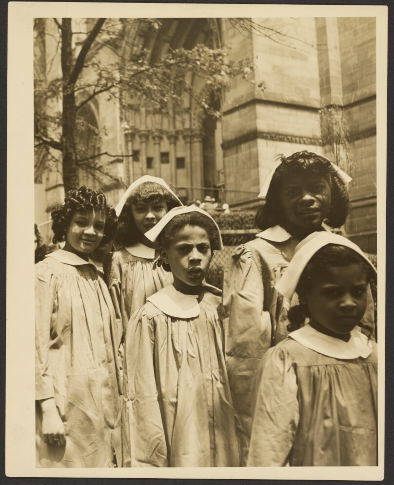 [Choir girls outside the Cathedral of Saint John the Divine]