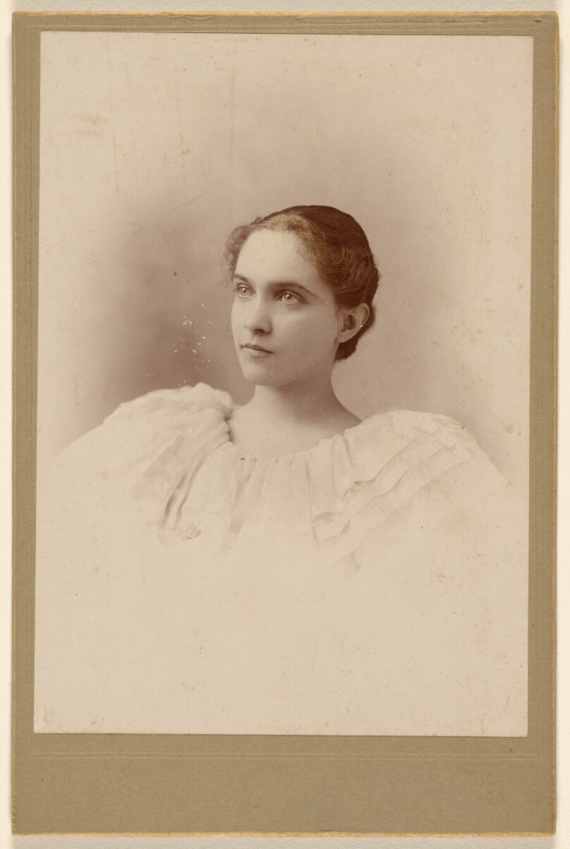 [Unidentified woman, in 3/4 profile]