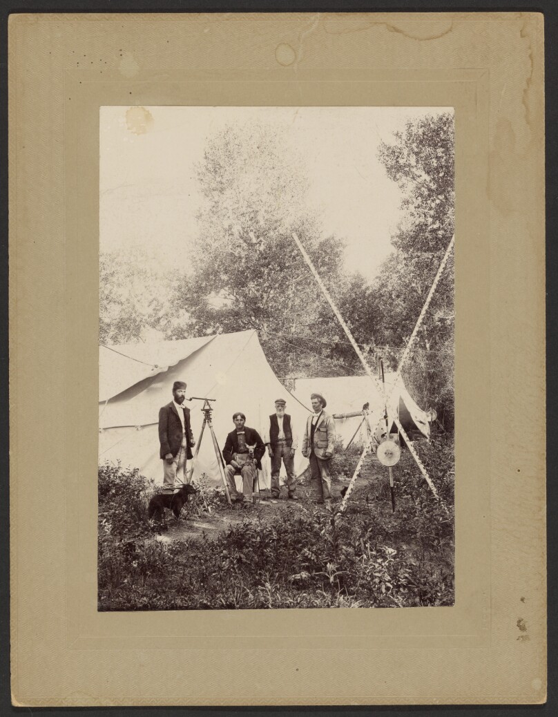 [Surveyors at campsite]
