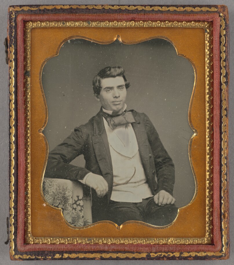 [Portrait of a Seated Man with Large Bow Tie]