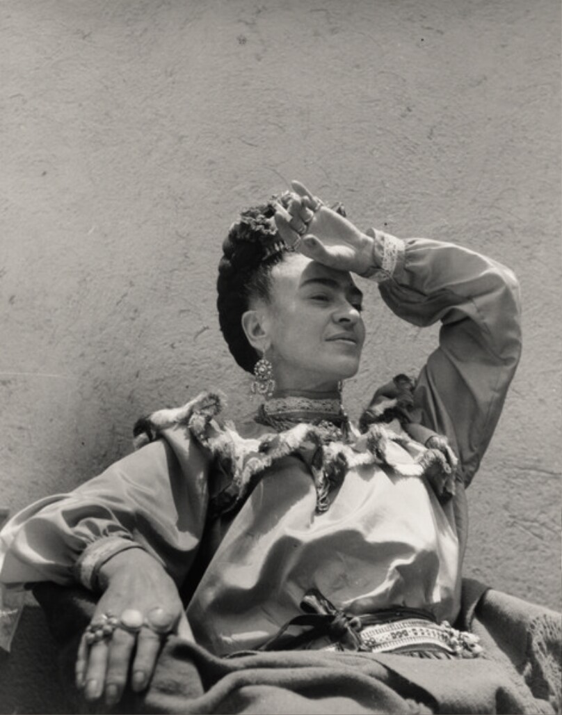 [Frida Kahlo with hand on forehead]