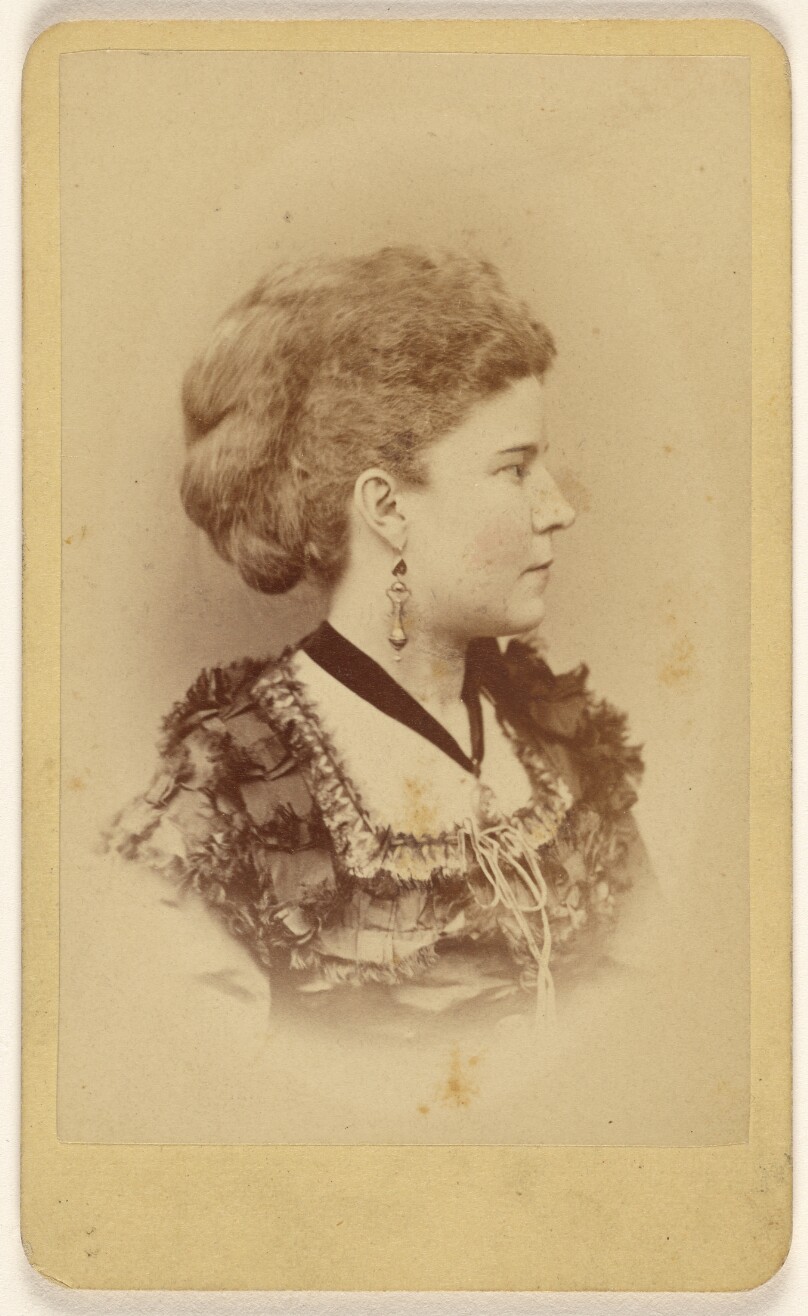 [Unidentified woman in profile]