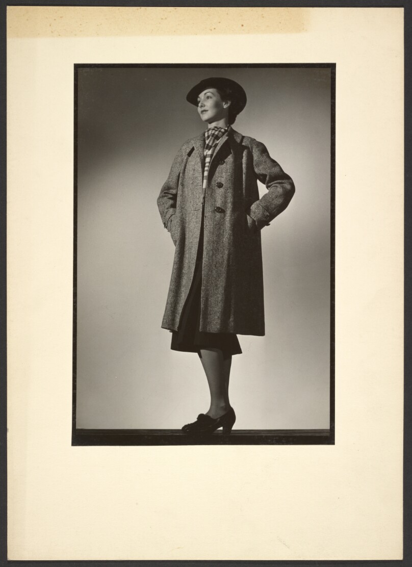 [Woman modeling coat]