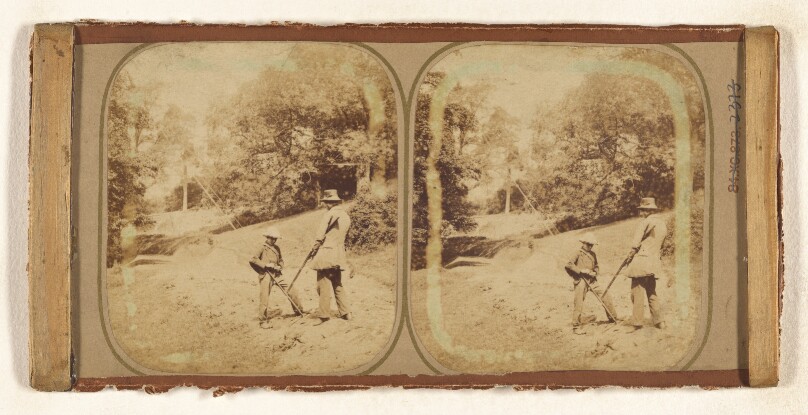 [Boy and man hunting]