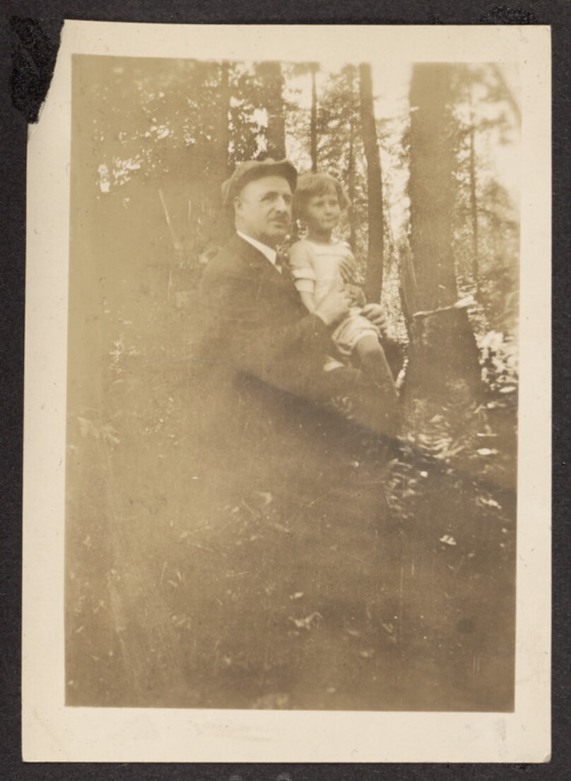 [Man and young girl in the woods]
