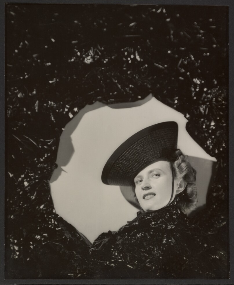 [Woman wearing a hat]