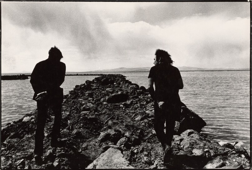 Robert Smithson and Richard Serra walking on Spiral Jetty, Great Salt Lake, Utah