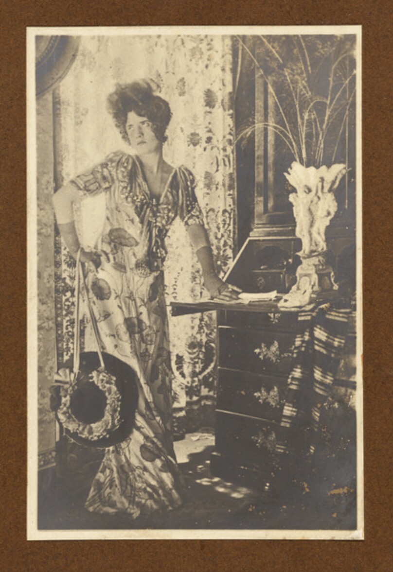 [Bored woman at desk]