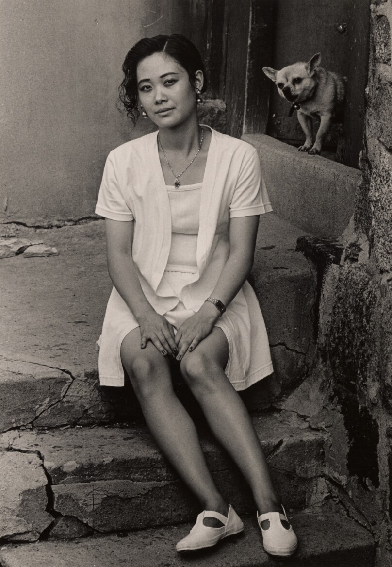Seated Young Woman with Small Dog