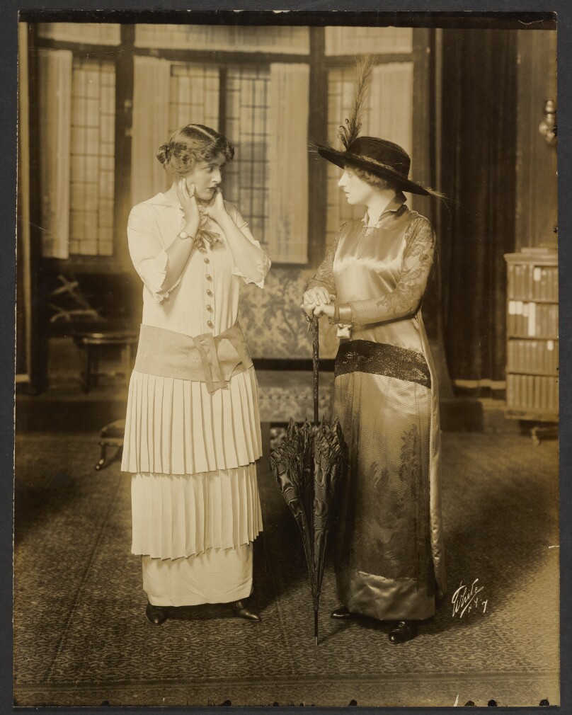 [Two actresses on stage]