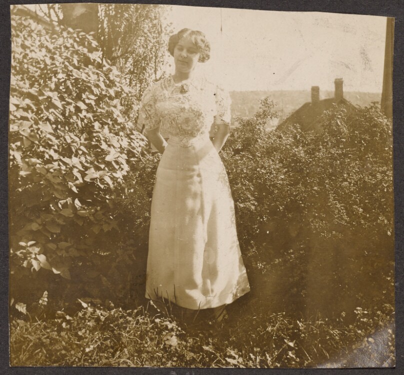 [Woman in a white dress with lace]