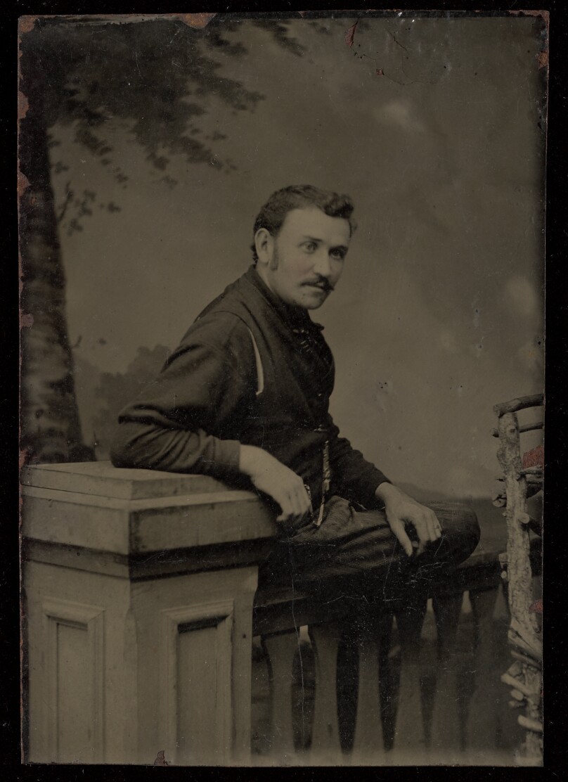 [Unidentified man with moustache, seated]