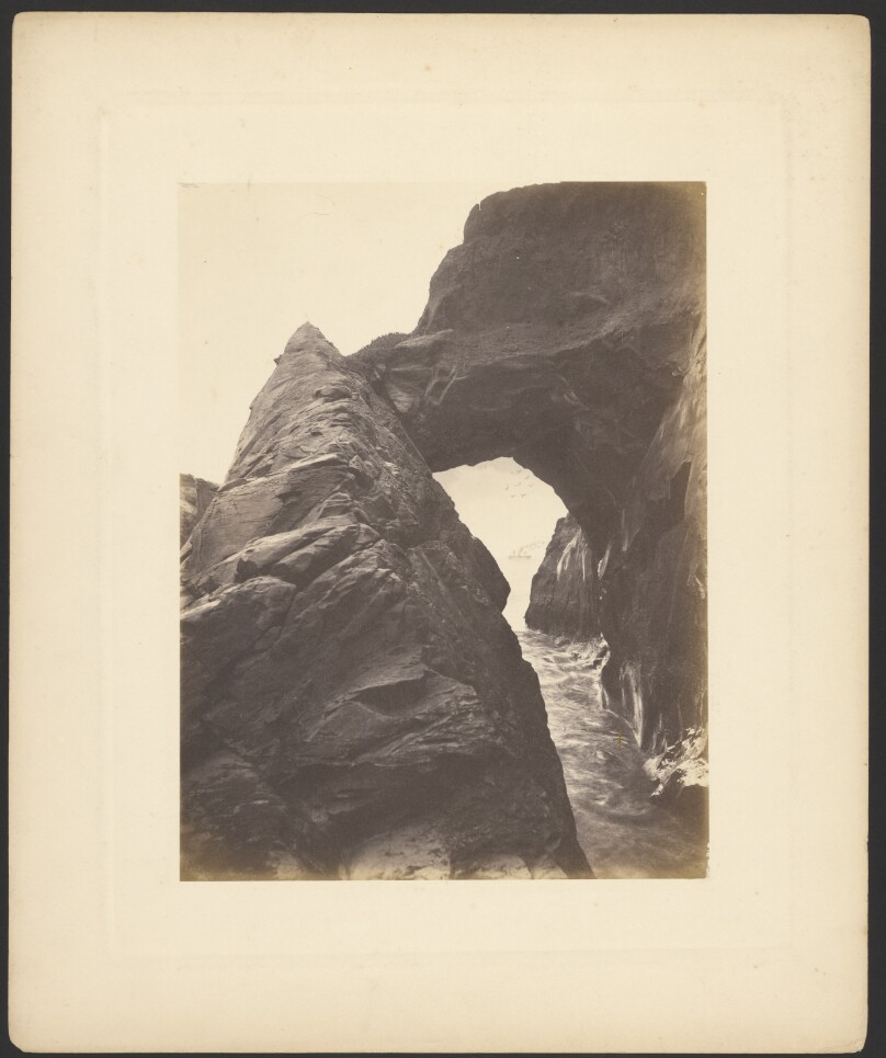 [Rock formation over ocean]