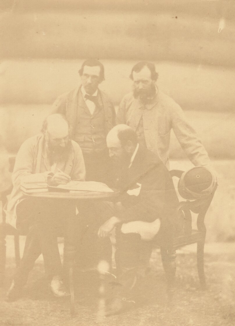 [Group portrait of four men, India]