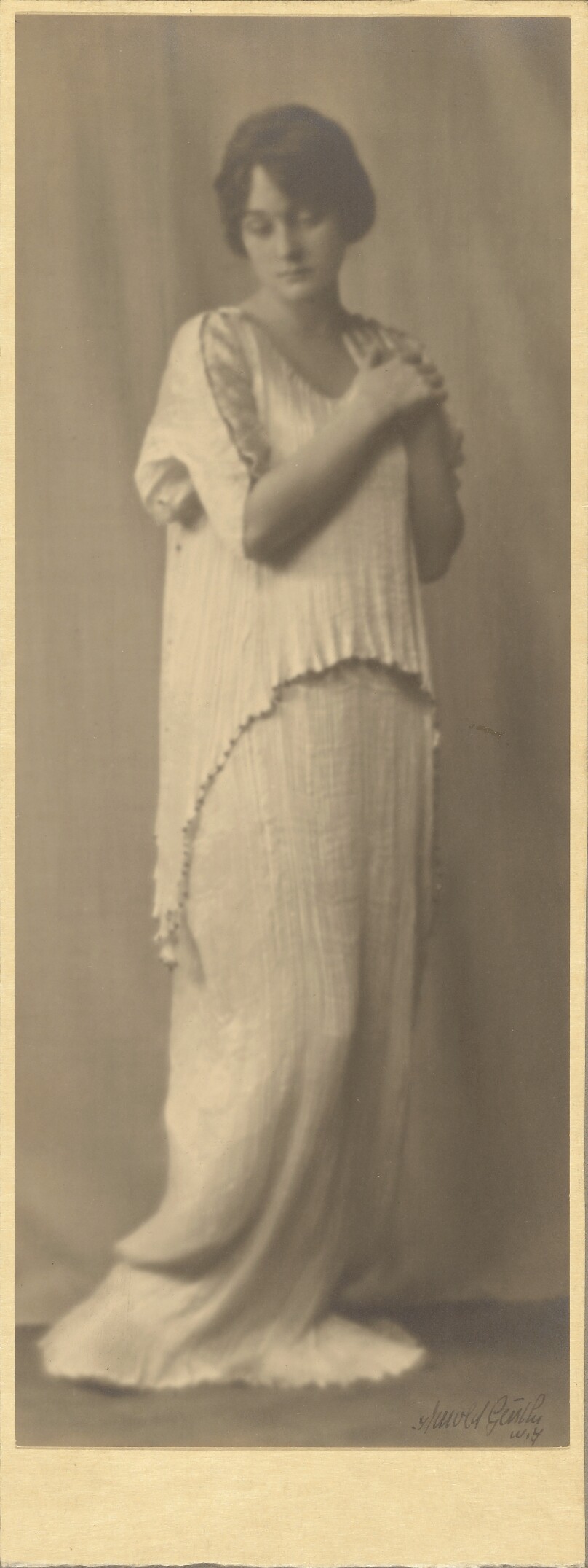 [Woman Wearing a Fortuny Dress]