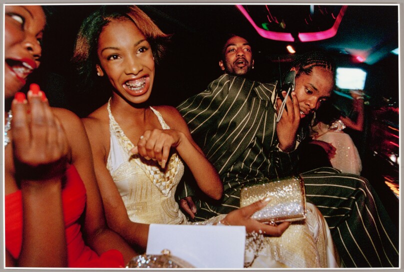 Crenshaw High School girls selected by a magazine to receive “Oscar treatment” for a prom photo shoot take a limo to the event with their dates, Culver City, California, 2001
