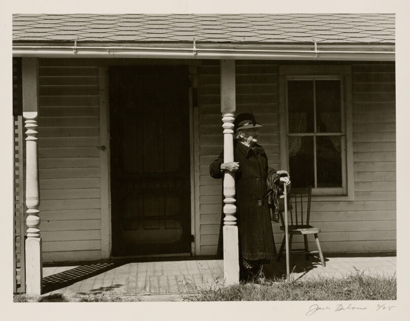 [Elderly Woman on Porch]