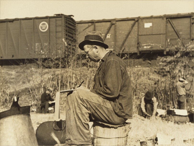 Writing Home in Railroad Jungle, near Sacramento, California