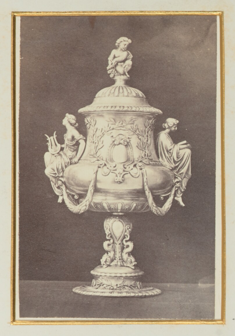 [Ornate vase with a cherub and two women]