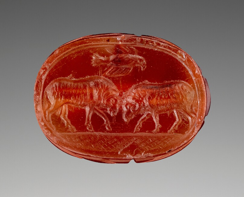 Engraved Scarab with Two Rams Butting Heads