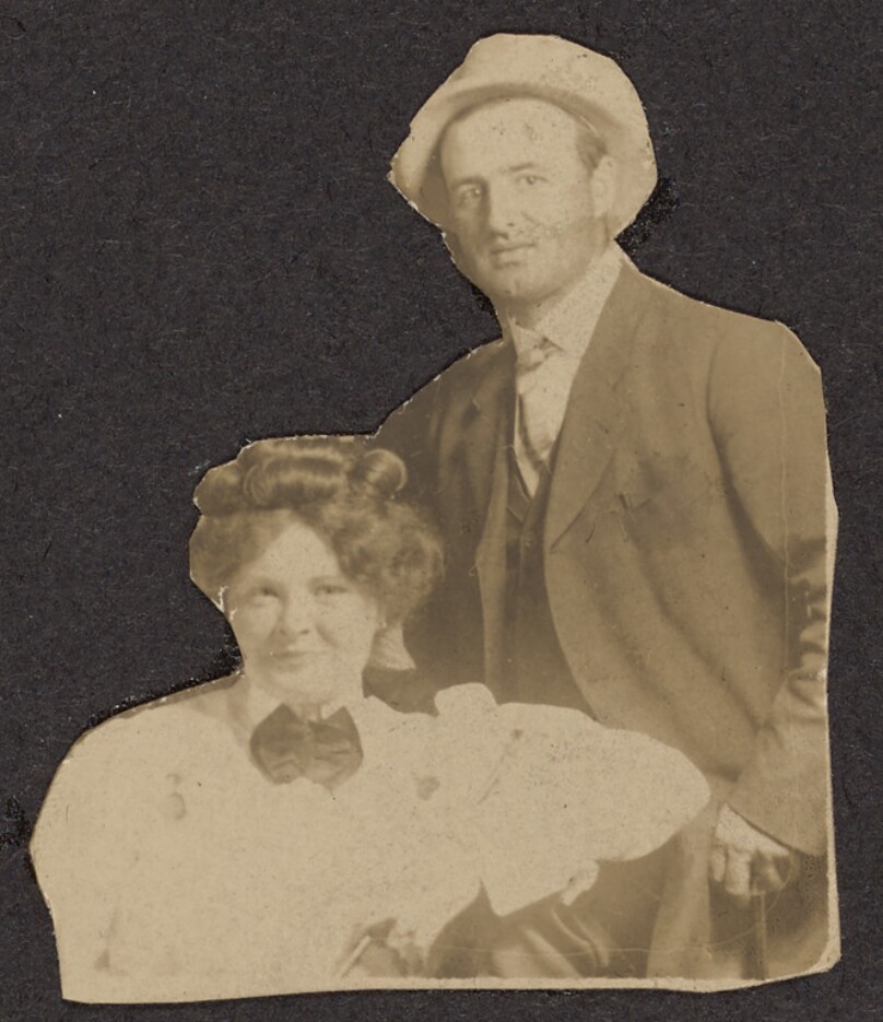 [Man and woman pose for the camera]
