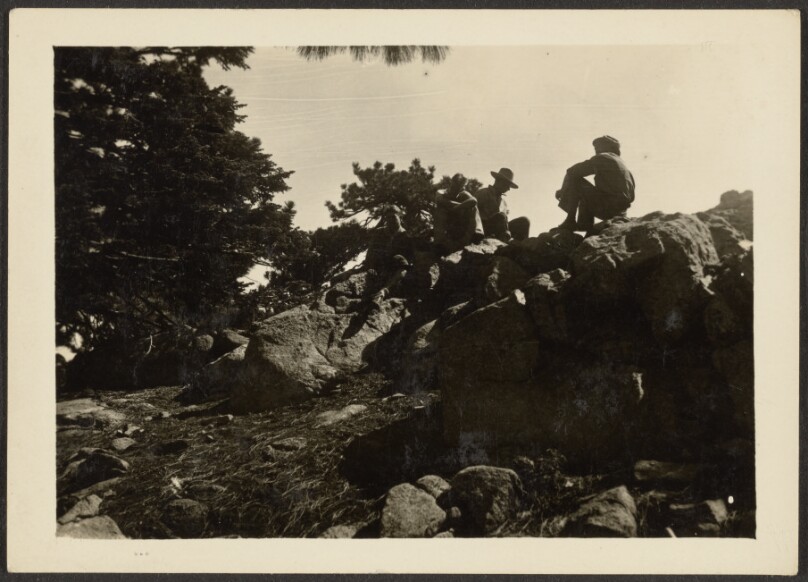 [Figures in Rocky Landscape]