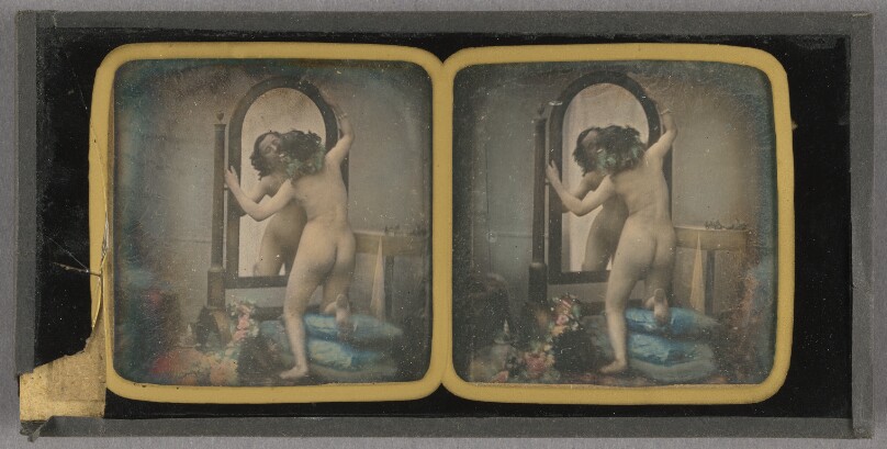 [Female Nude kissing her reflection in a mirror]