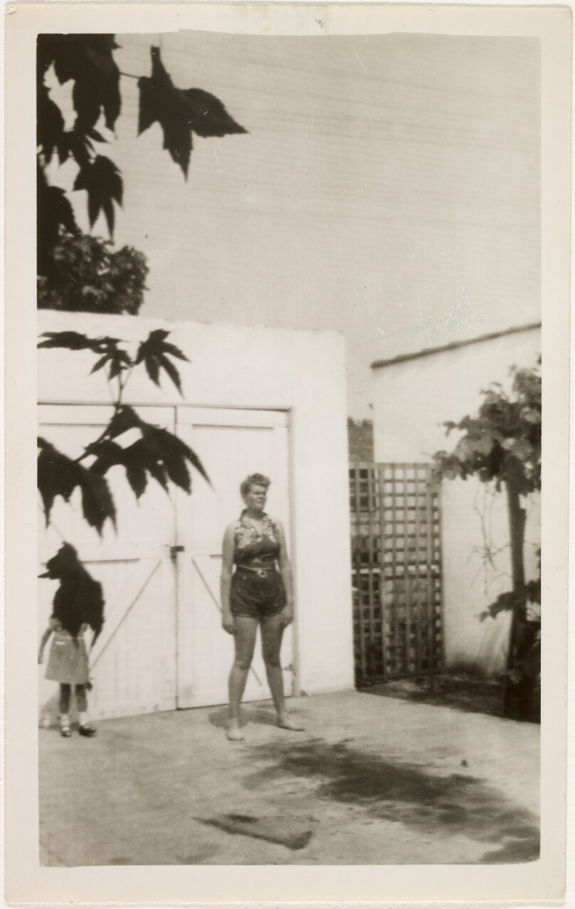 [Woman and girl on driveway]