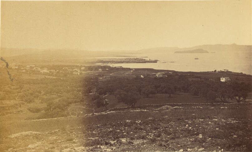 Kaleppa [distance view of the harbor and town].