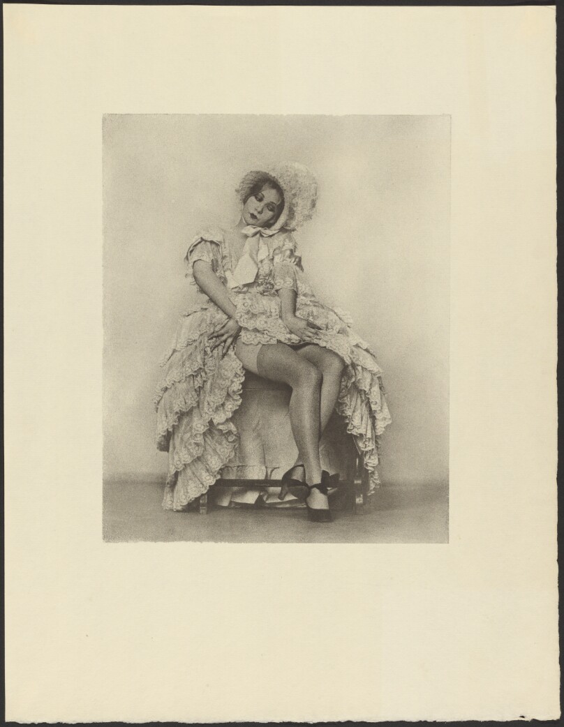 [Seated Woman in a Ruffled Dress with Coquettish Facial Expression]