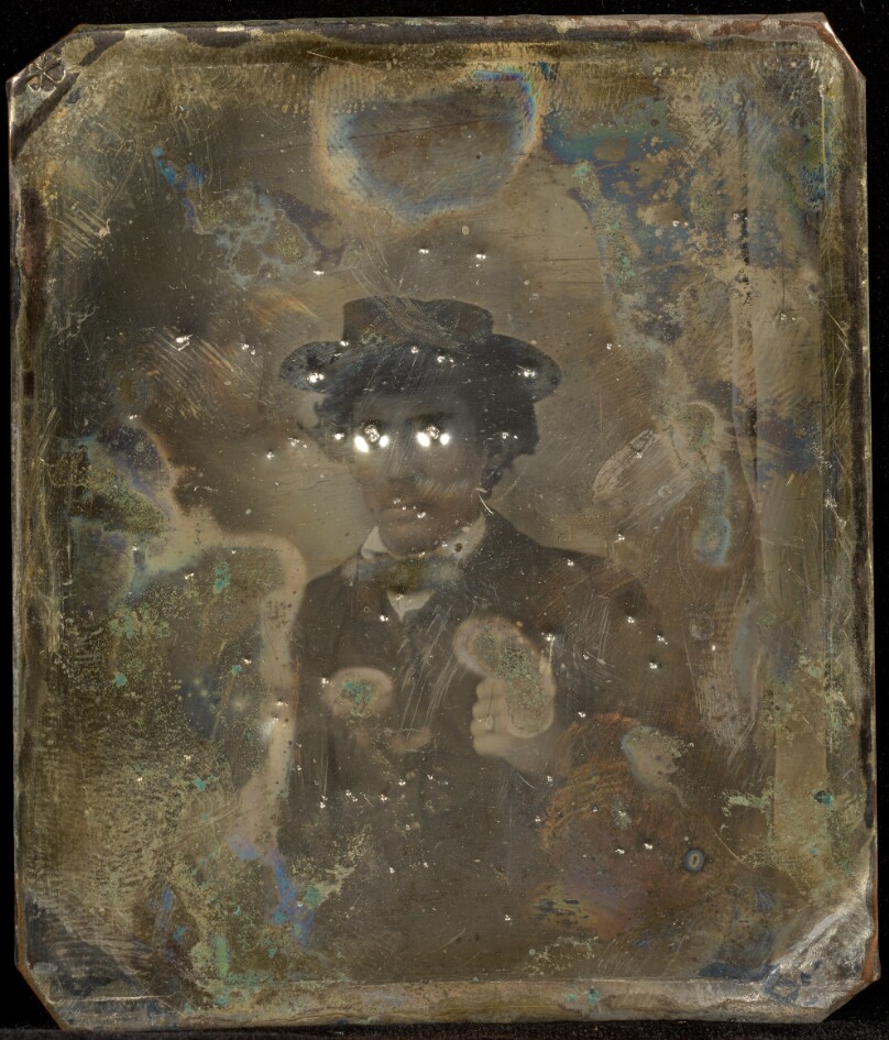 [Portrait of a Man in Hat]