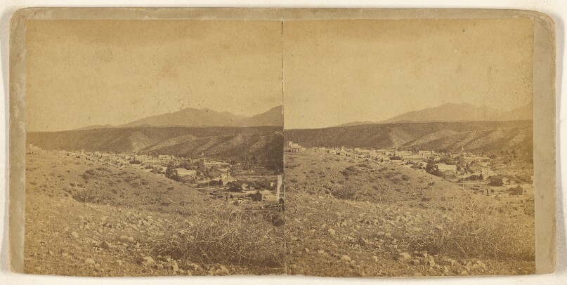 [Long view of a town in Arizona, possibly at Phoenix, Flagstaff or Globe]