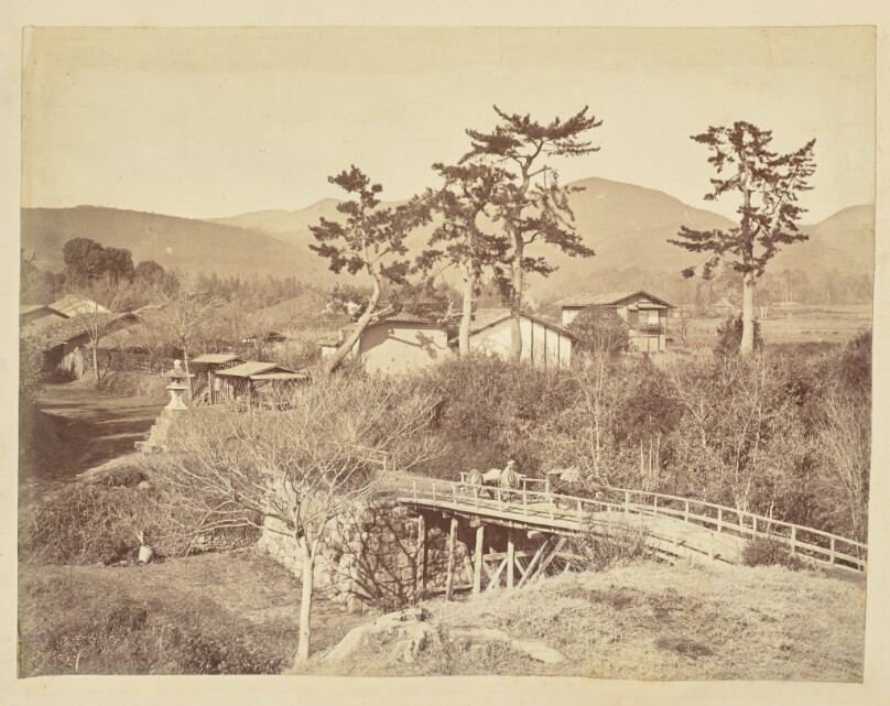 [Man and ox crossing a bridge]