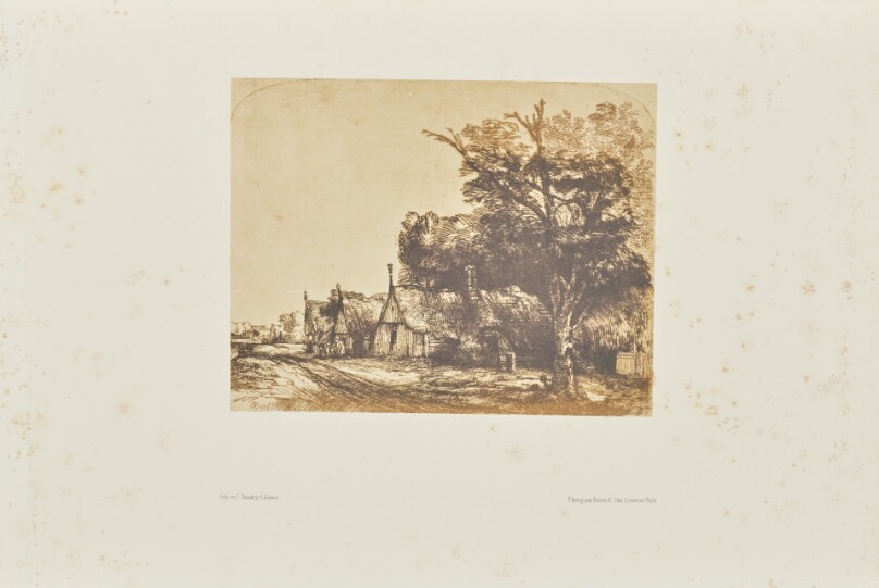 [Landscape with three gabled cottages beside a road]