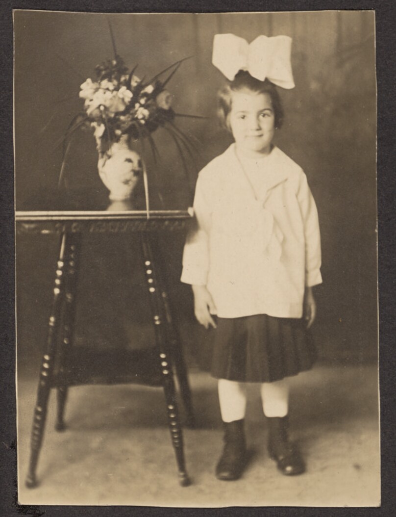 [Young girl with a bow]