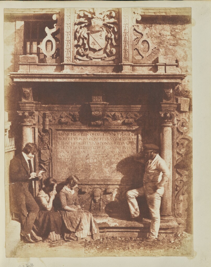 [Greyfriars' Churchyard, the Dennistoun Monument with D.O.Hill, his nieces and an unknown man]