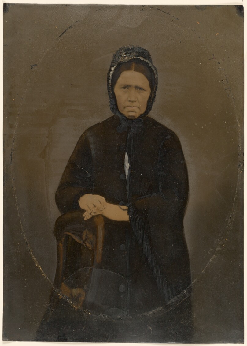 [Portrait of woman in bonnet]