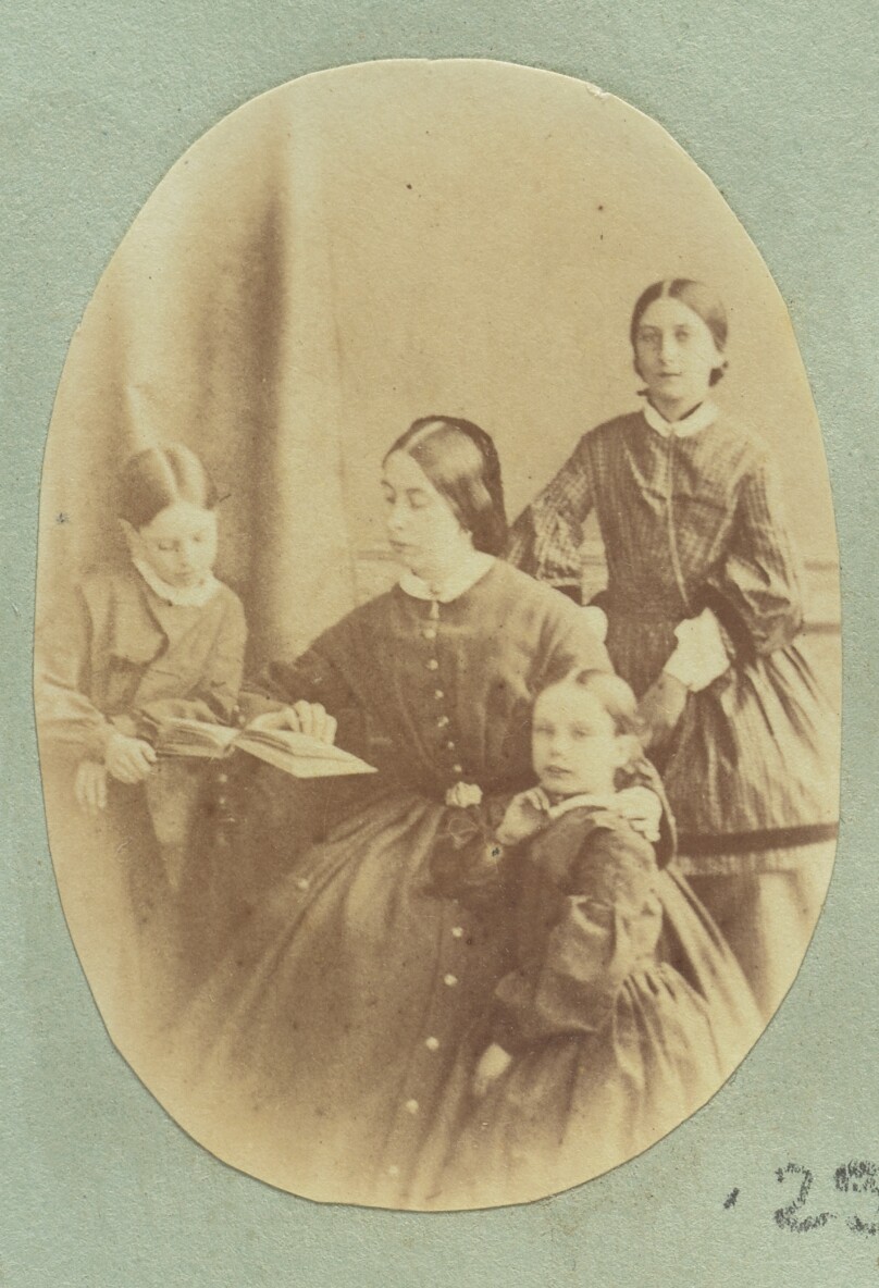 [Portrait of woman and three children]