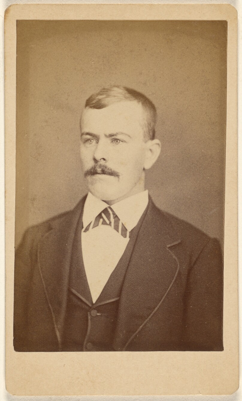 [Unidentified man with moustache]