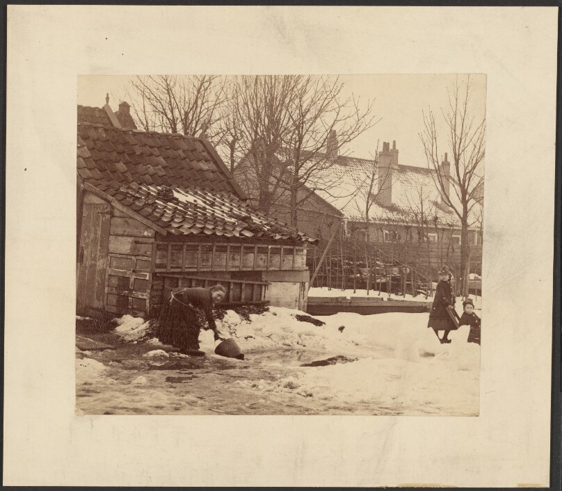 [Woman collecting water in snow]