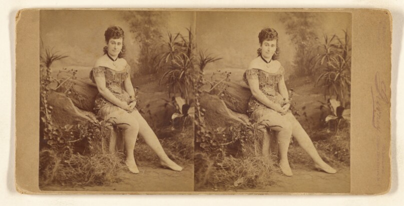 [Unidentified actress seated]