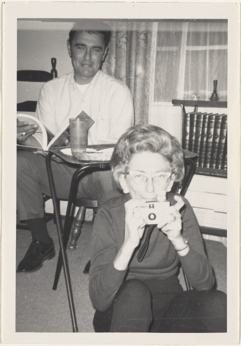 [Man and woman with Instamatic camera]