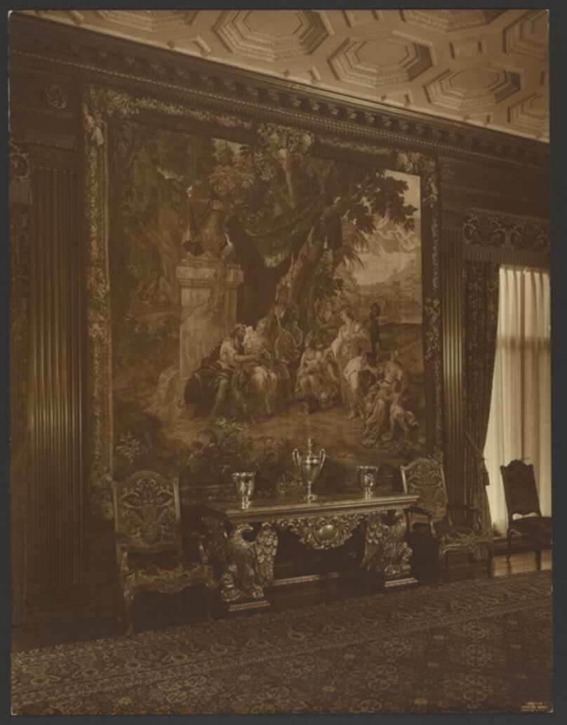 [Room interior with tapestry]