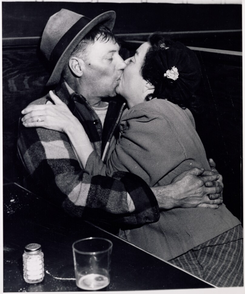 [Couple Kissing in a Bar]